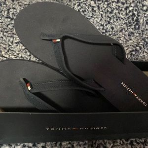 Navy blue size 10 fits like a size 9 Tommy Hilfiger flip-flop